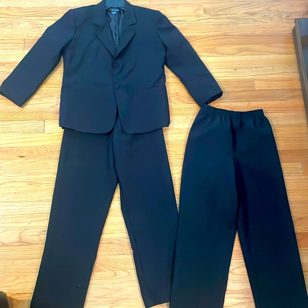 Black suit size 14 boys with two size 14 boys pants.